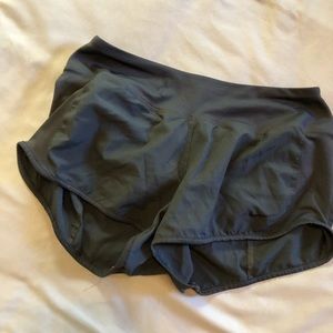 Black Nike running shorts